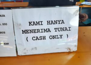 Polling Hensa: Mayoritas Warganet Nilai Kebijakan Tak Terima Uang Tunai “Menyusahkan Pembeli”